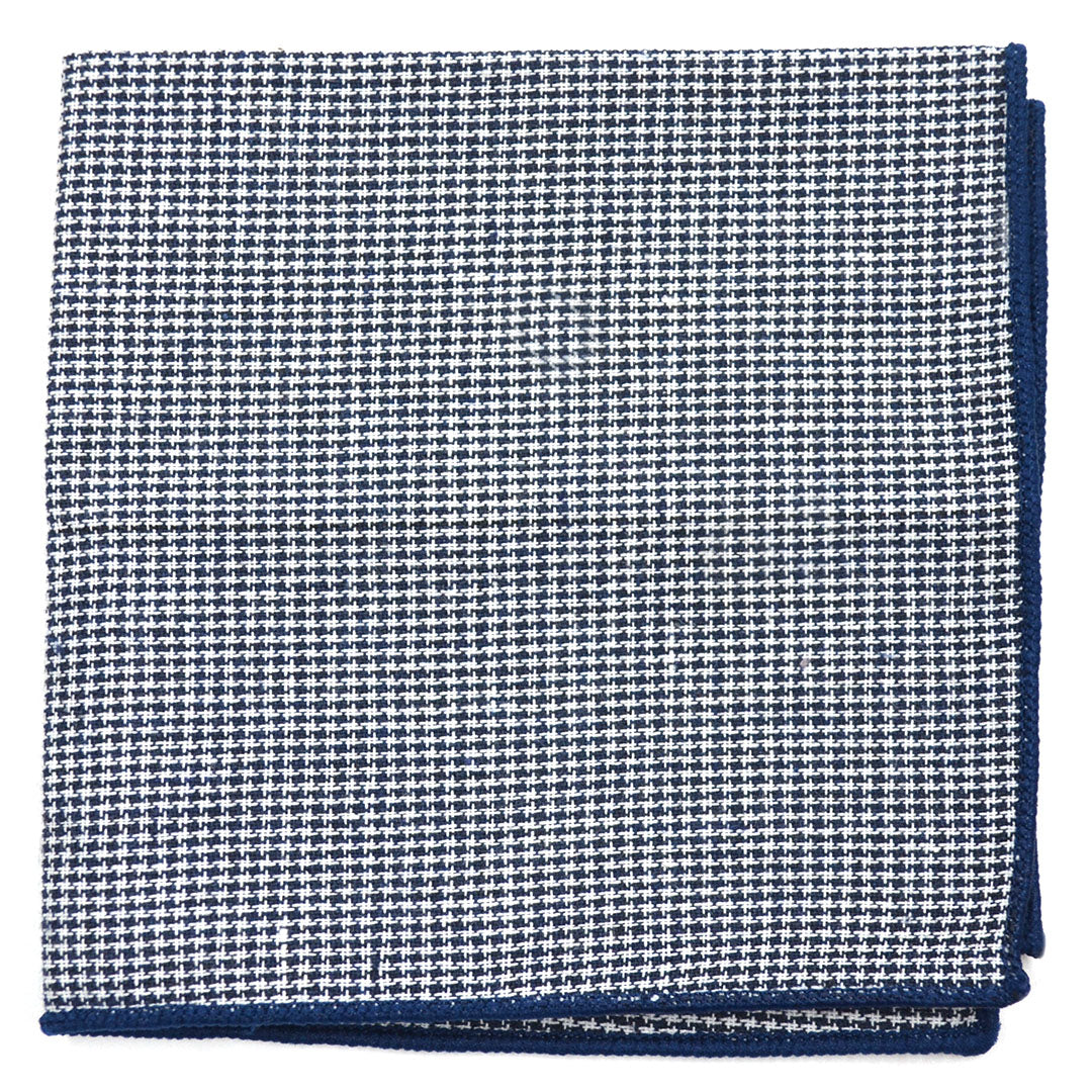 Folded pocket square with a blue and white check pattern on a white background