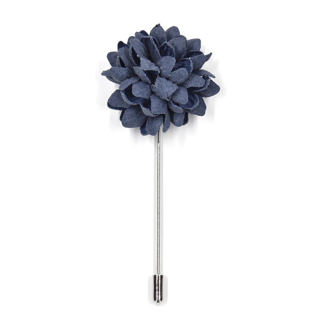 Navy blue flower lapel pin on a white background