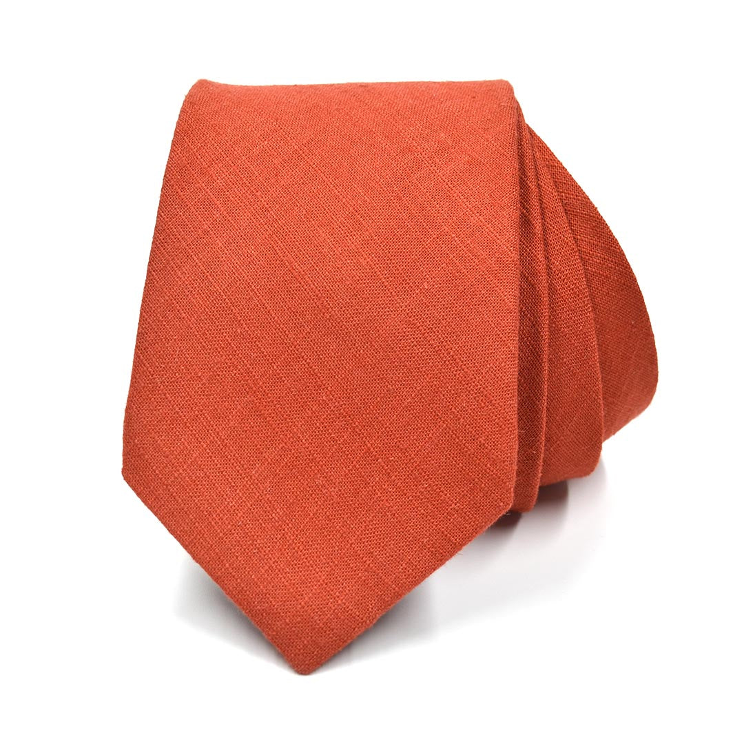 Orange tie on a white background