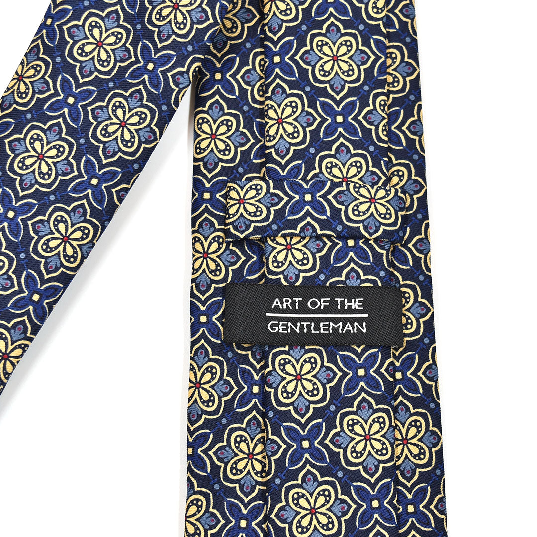 Regal Clover Navy Blue Tie with 'Art of the Gentleman' label on a white background