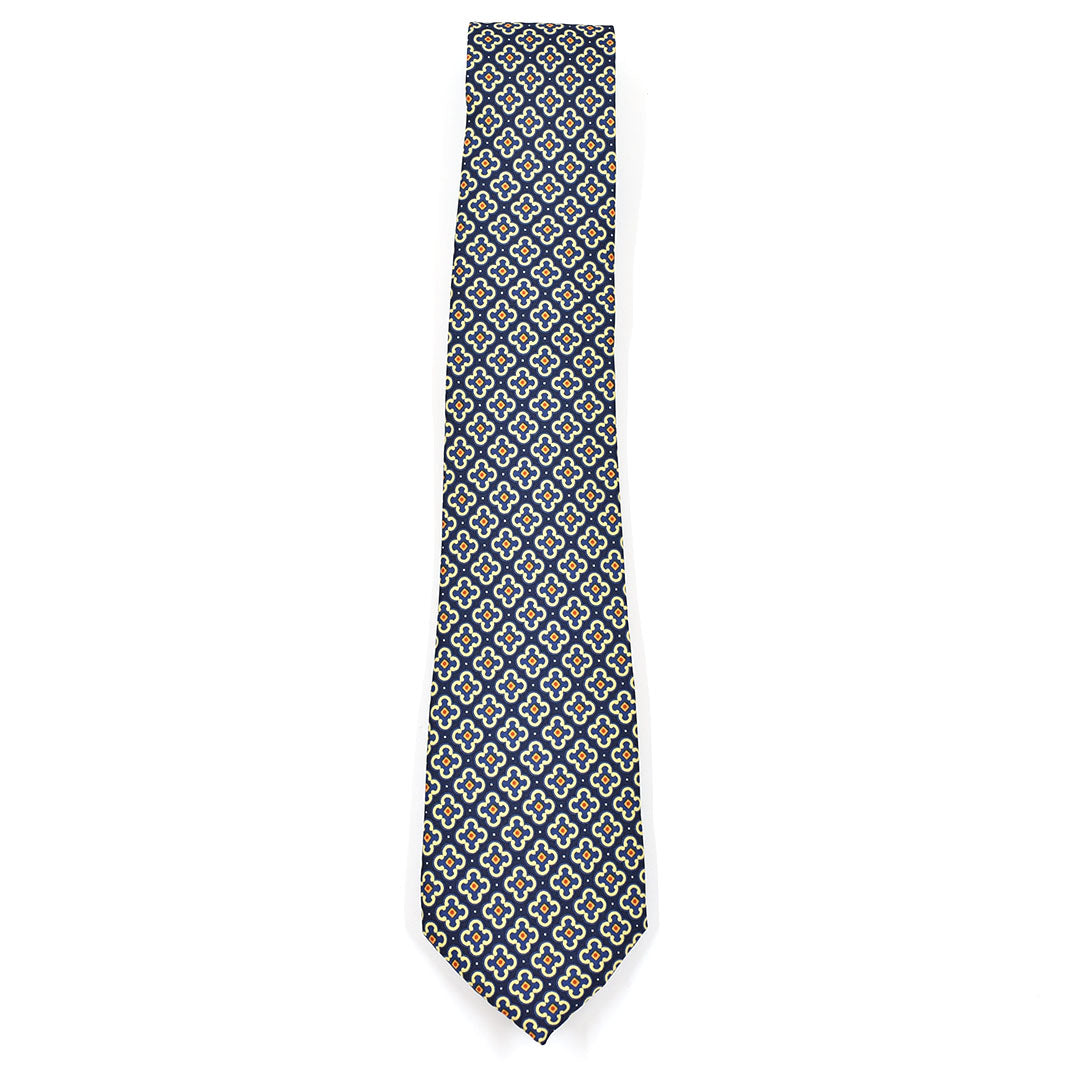 Patterned blue tie on a white background