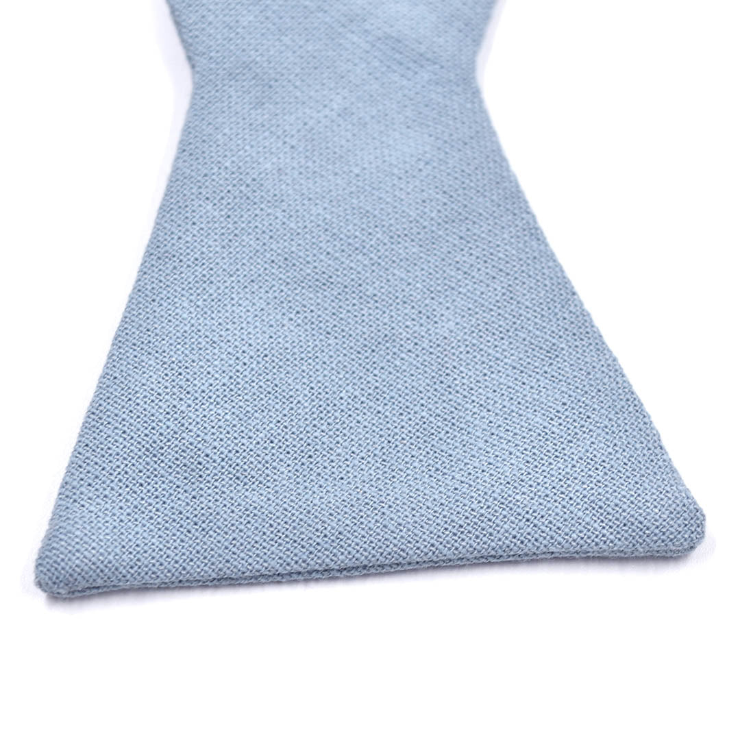 Detail shot of solid dusty blue cotton bow tie