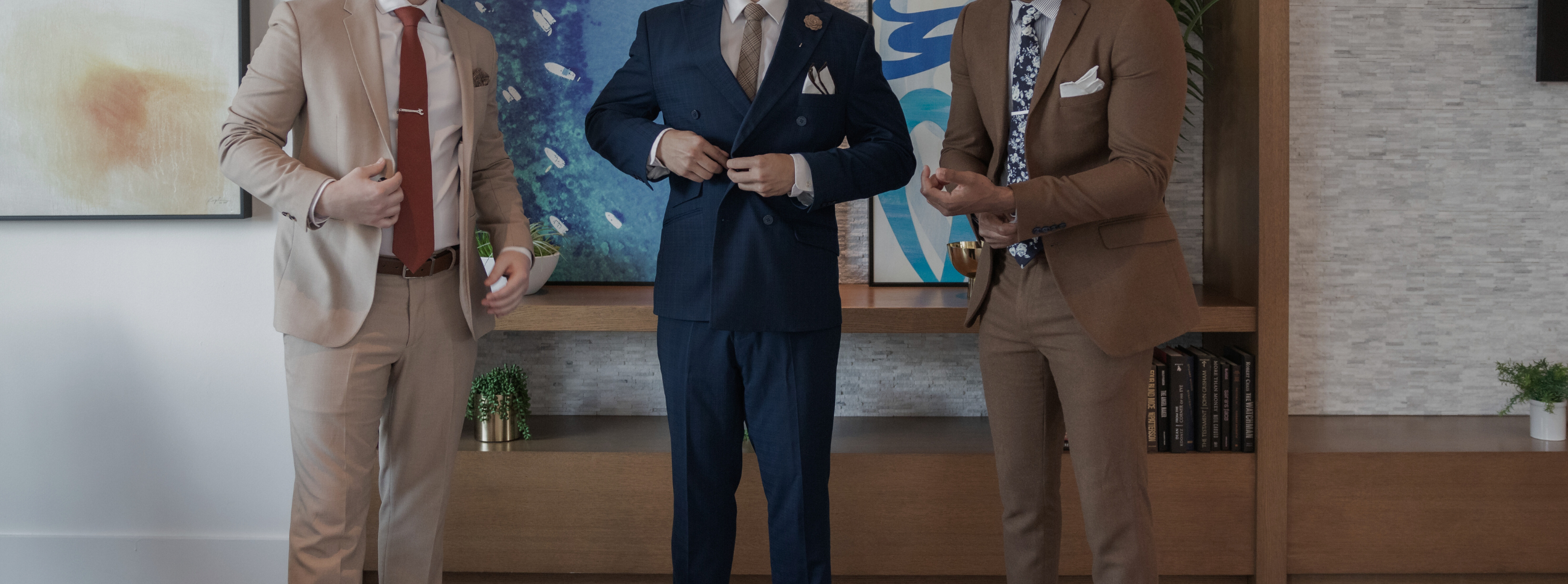 three gentlemen standing
