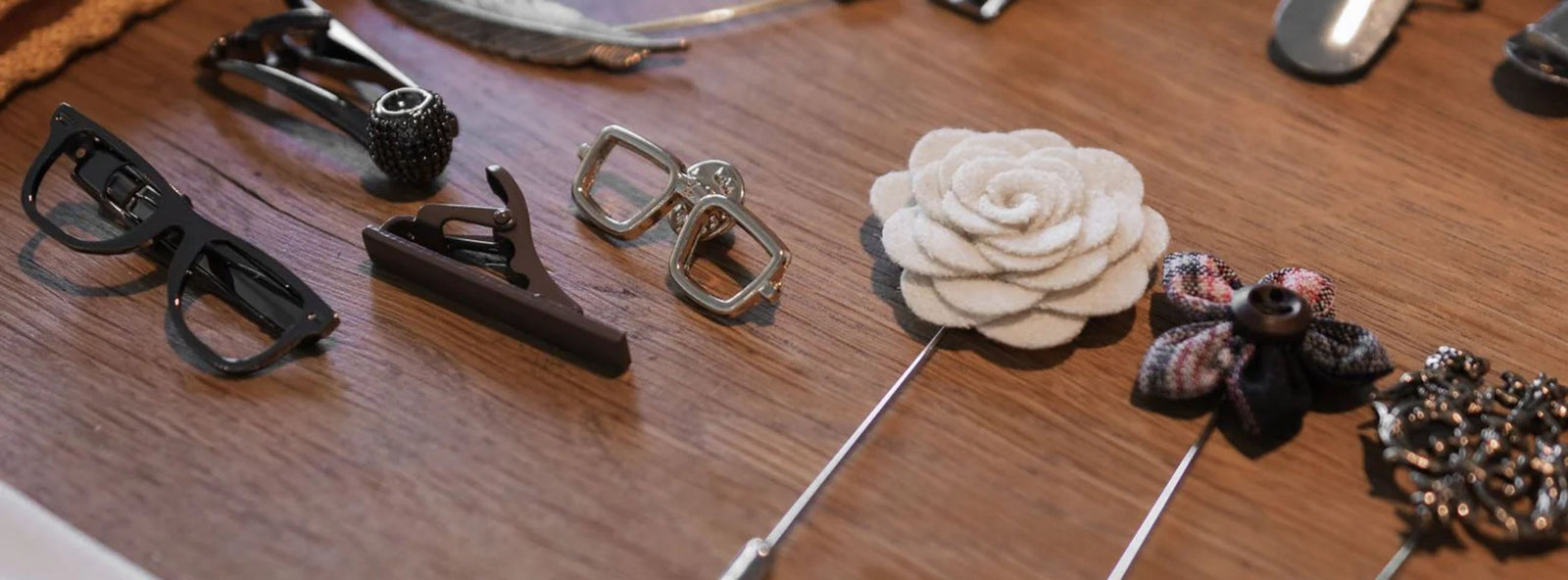 Small suit accessories on a table. 