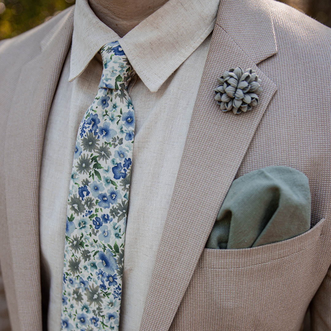 Tan suit with linen shirt and Floral Wedding Blue Cream Tie with Sage green Pocket Square 