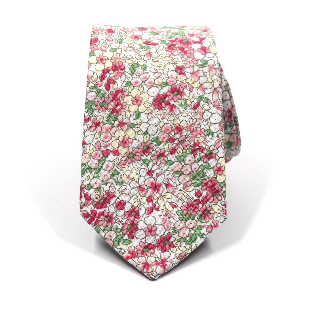 the floral coral pink tie rolled up