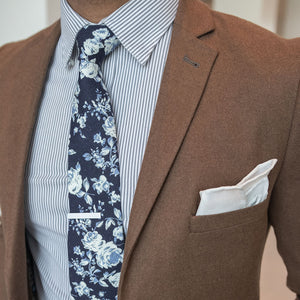 Floral Navy Buds Tie Vintage style paired with a brown suit