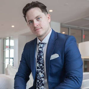 Floral Navy Buds Tie Vintage style paired with a blue suit