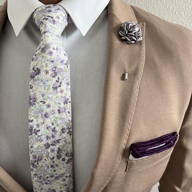 Model posing in the floral lavender tahiti tie