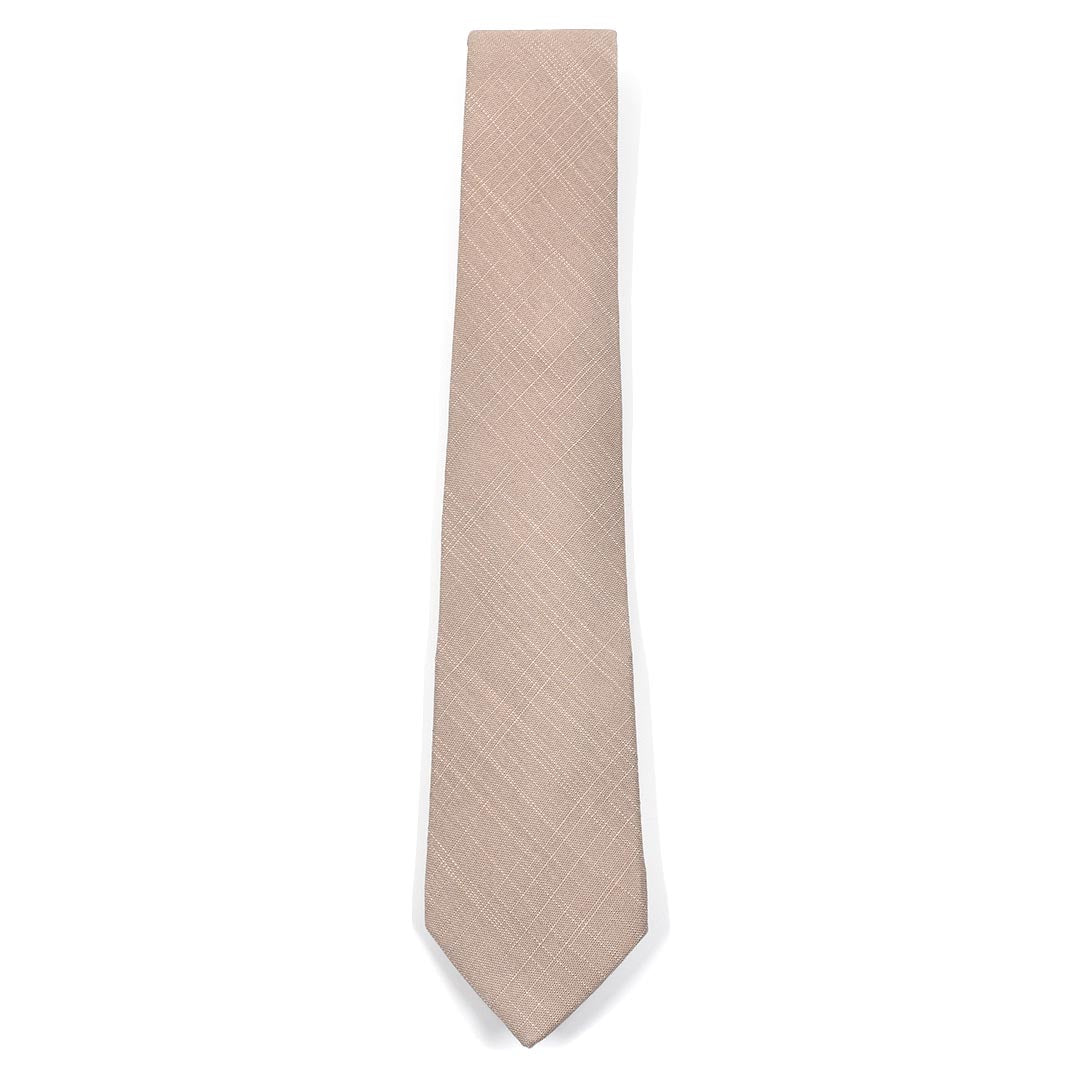 Beige tie with a subtle pattern on a white background
