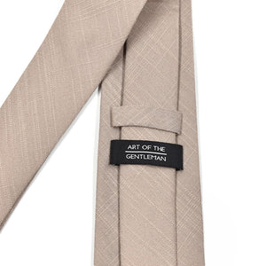 Beige suit jacket with a visible brand label on a white background