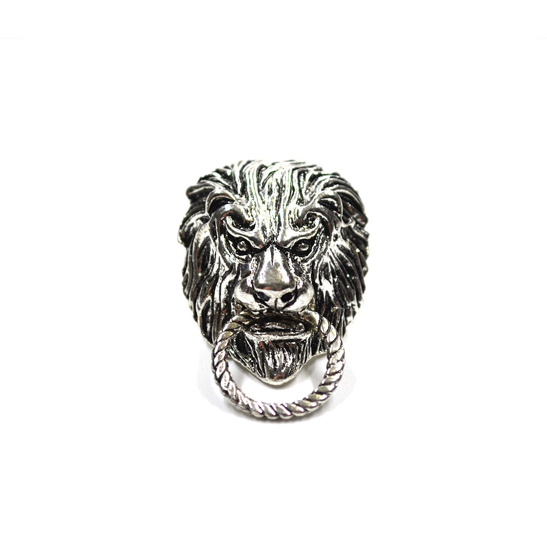 Silver Lion lapel pin with door knocker ring in its mouth on white background