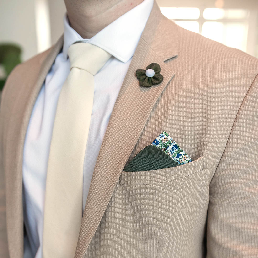 Microsuede Canary Ivory Tie Set with a tan suit