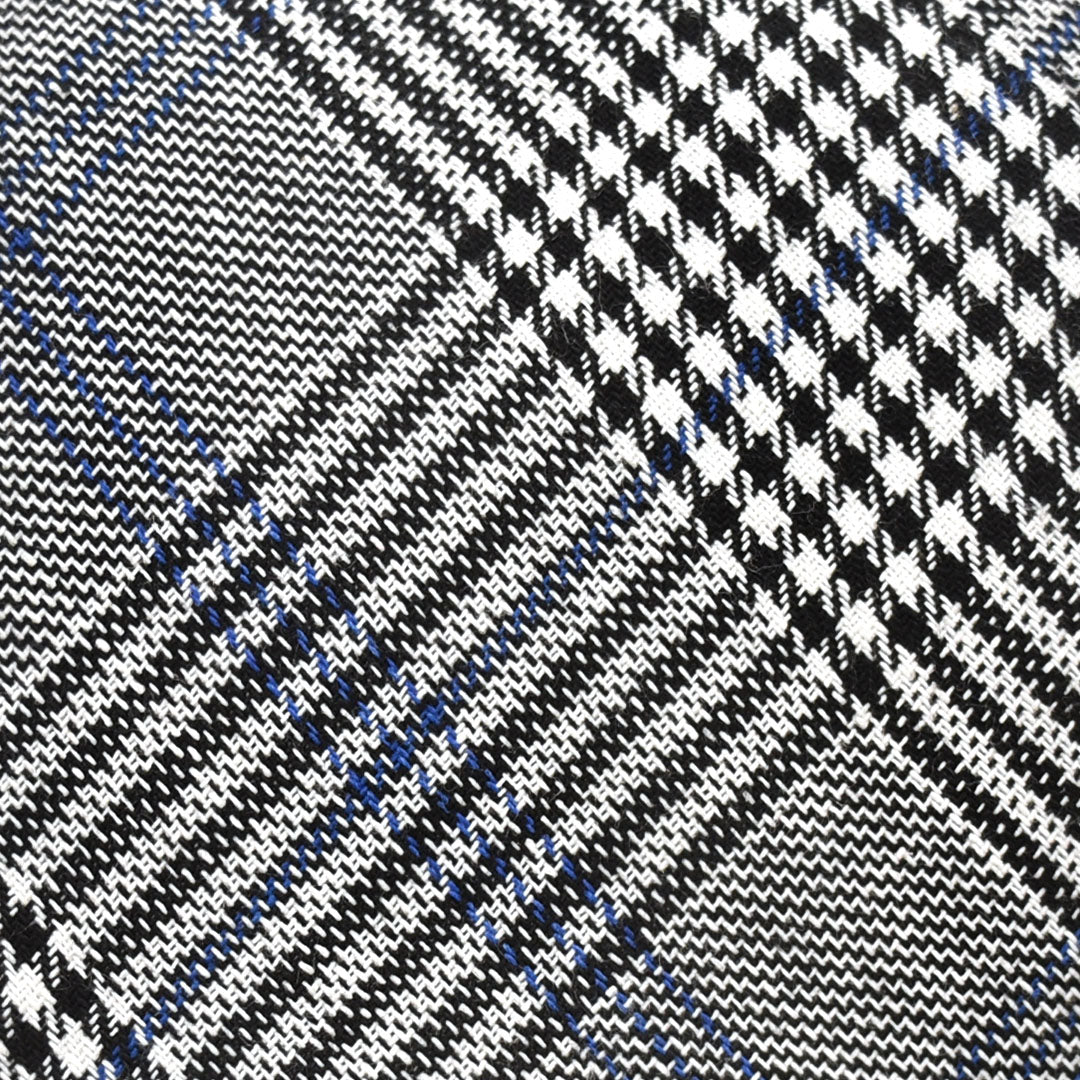 Close-up of a fabric with a black and white checkered pattern