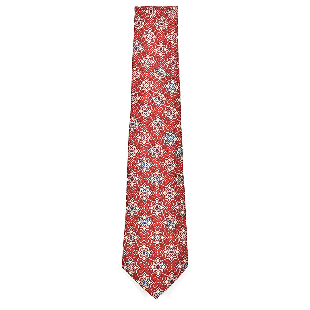 Red and Gold patterned tie on a white background