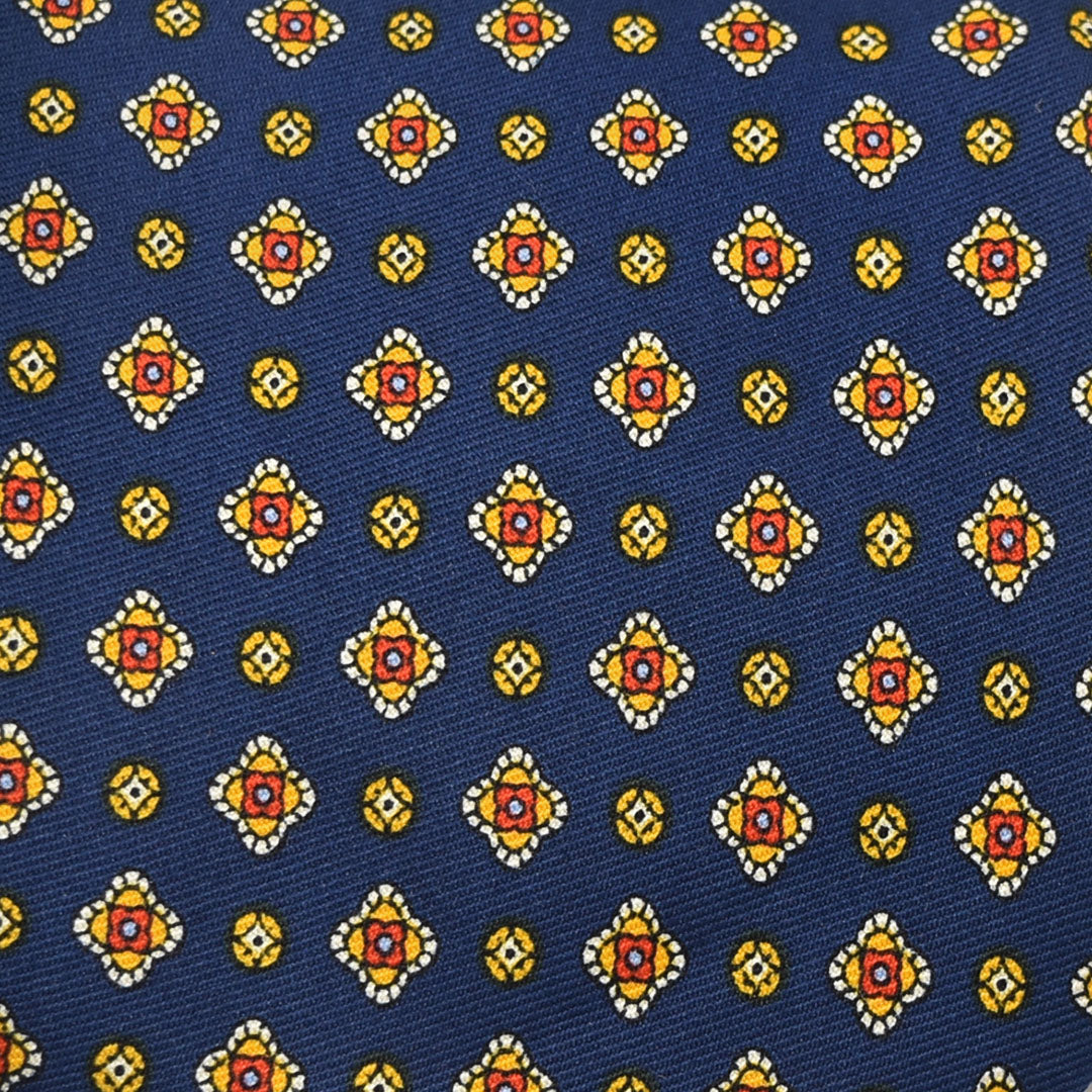 Patterned fabric with geometric design on a blue background