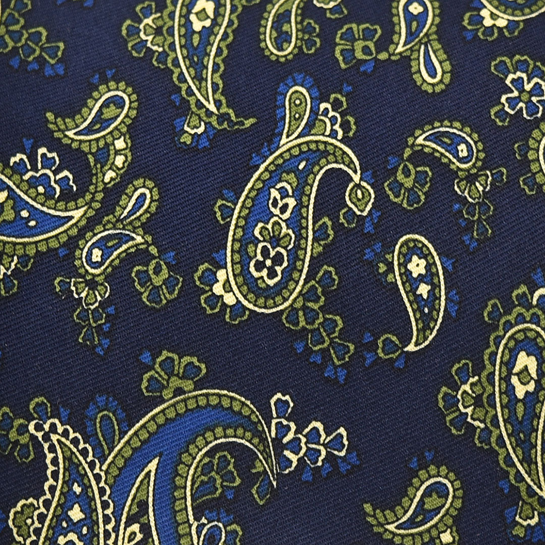 Patterned fabric with paisley design on a blue background