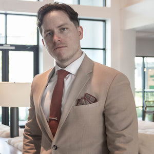 Plaid Checkmate Tan Pocket Square in a tan suit pocket
