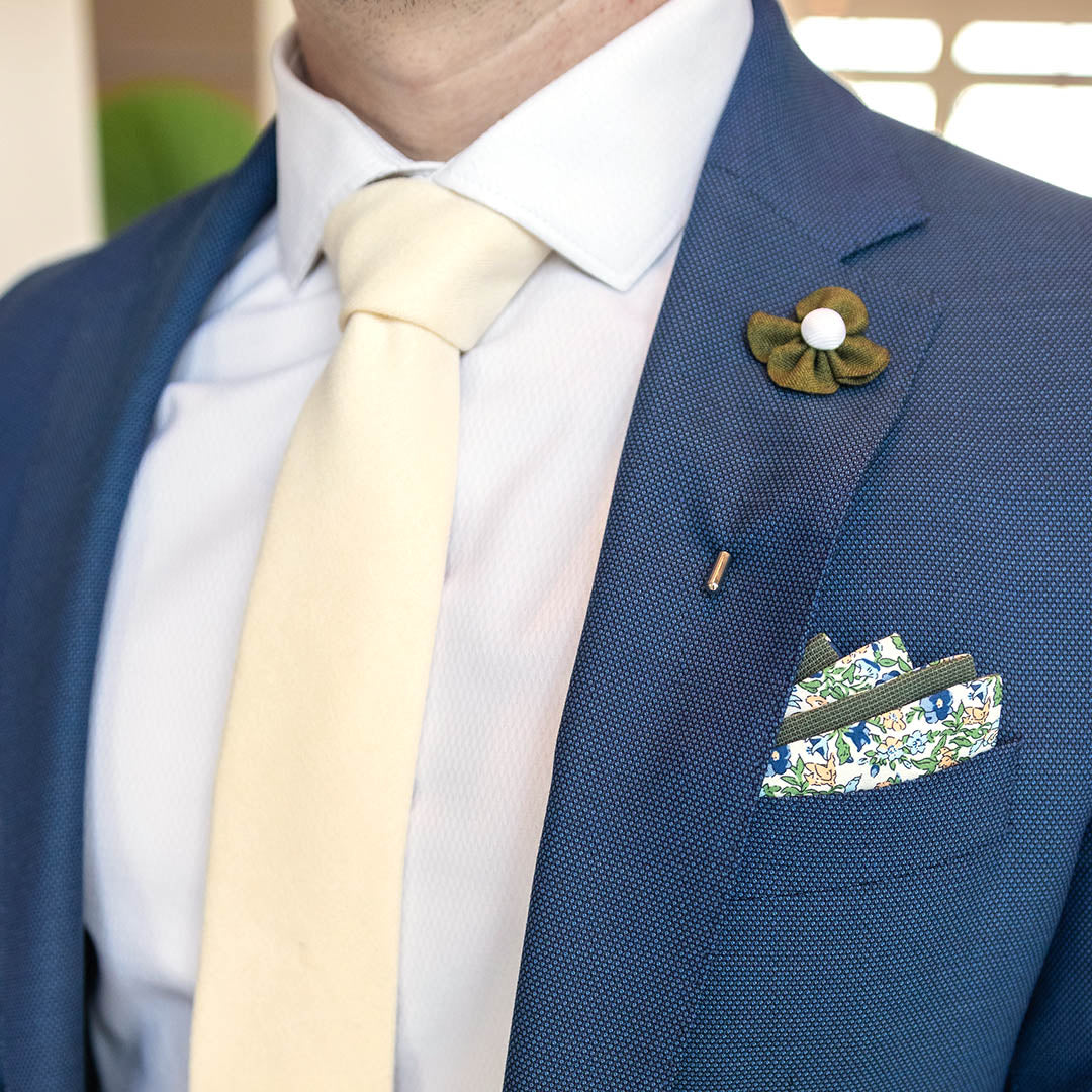 Microsuede Canary Ivory Tie Set with a blue suit
