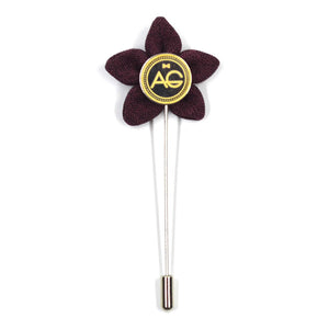 Lapel pin wildflower burgundy on a blue suit 