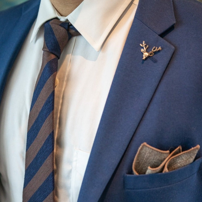 Striped Herringbone Brown Navy tie with navy suit