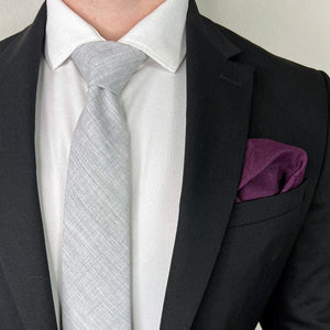 Herringbone Plum Pocket Square in a black suit pocket